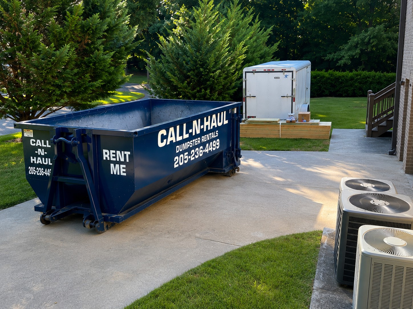 Call-N-Haul dumpster rental at a Birmingham residential cleanup project