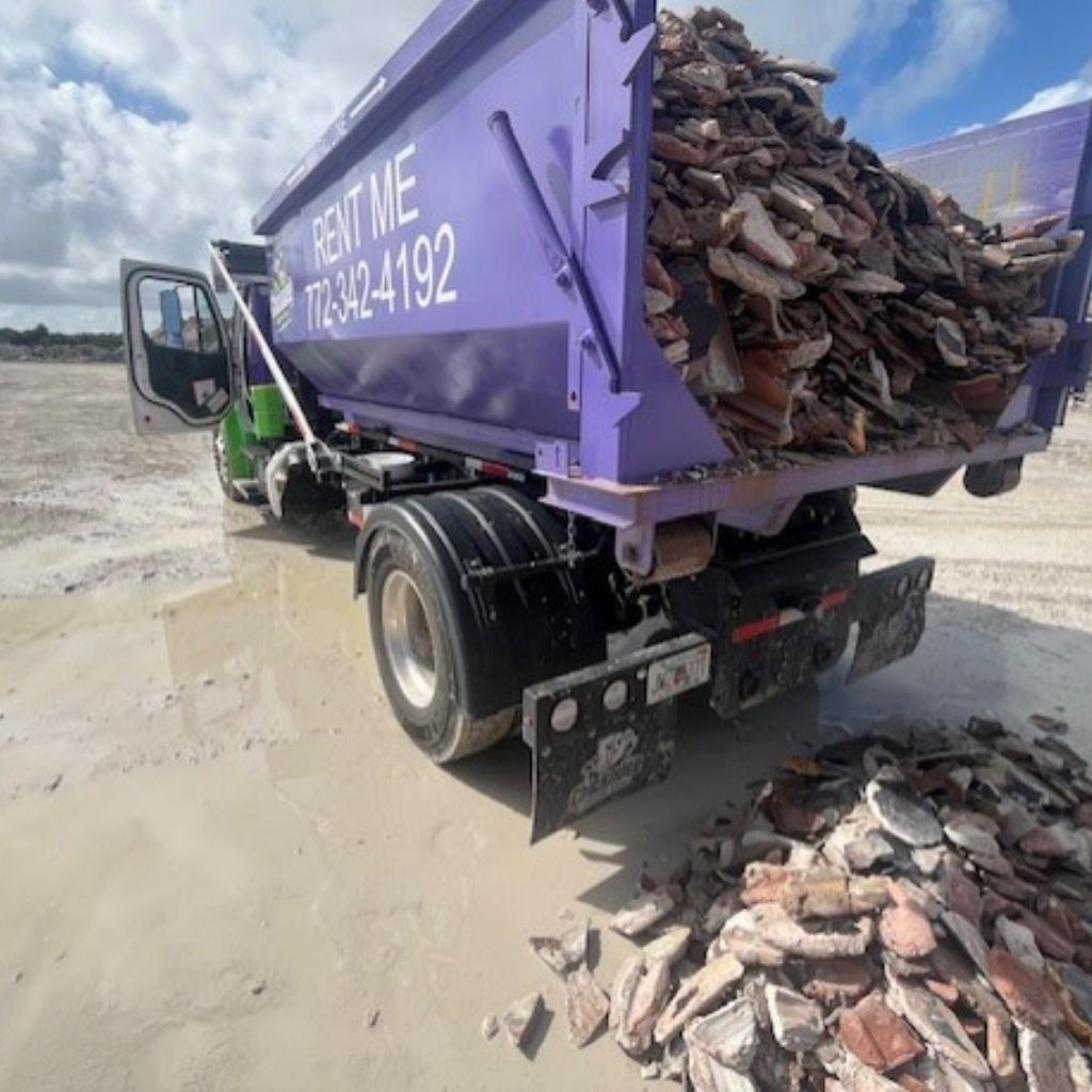 15-yard dumpster with tile roofing in Stuart fl Chickadee dumpster rental offers 10-, 15- and 20-yard dumpster