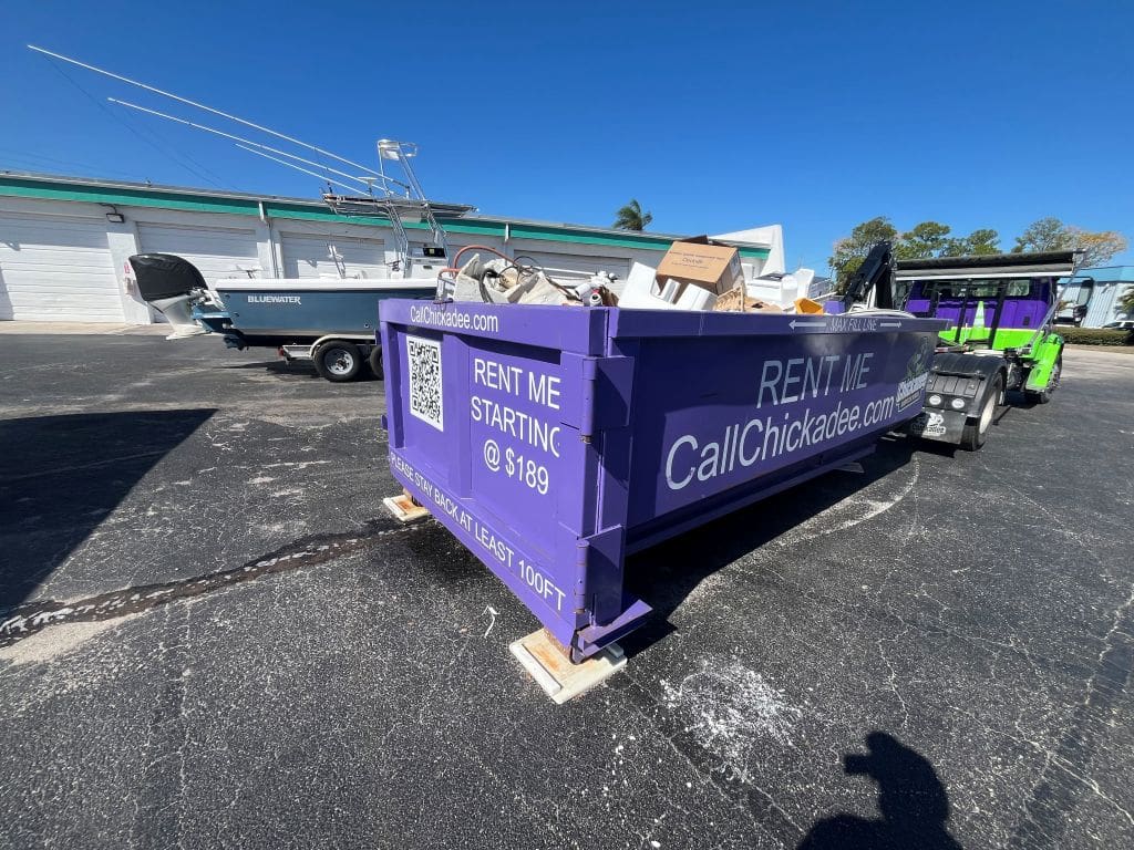 Dumpster rental delivery in Stuart FL driveway-safe roll-off dumpster by Chickadee