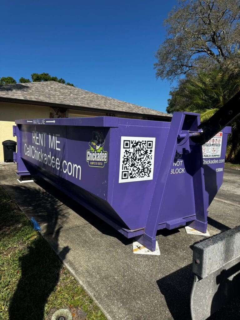 driveway safe dumpster rental placed in port st lucie home