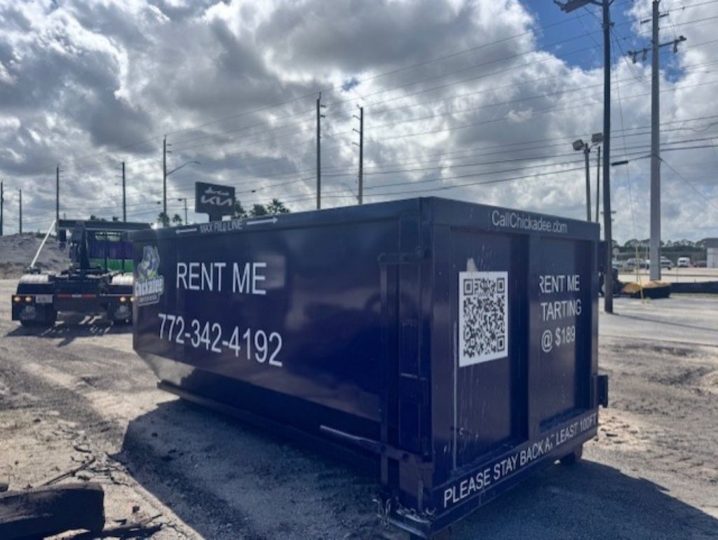 contractor dumpster rental job site on the Treasure Coast with roll off dumpster
