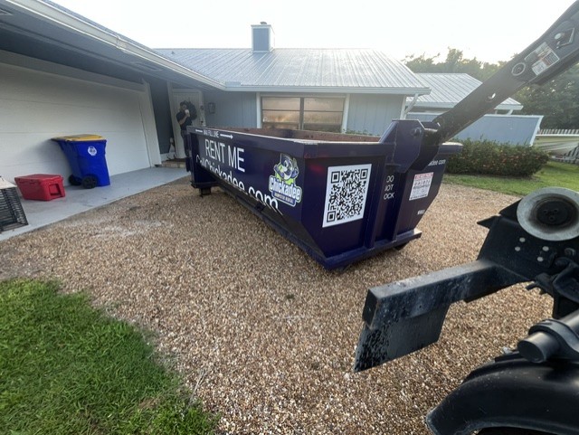 Chickadee 10-yard dumpster for a bathroom remodel in Golden Gate, Stuart FL