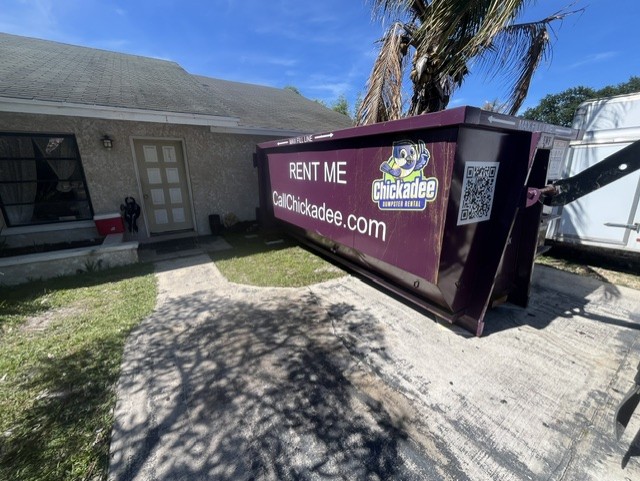 Chickadee 20-yard dumpster at a residential project in Golden Gate, Stuart FL