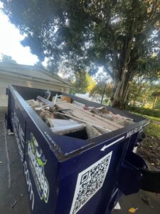 20-yard dumpster filled with home remodeling debris in Vero Beach