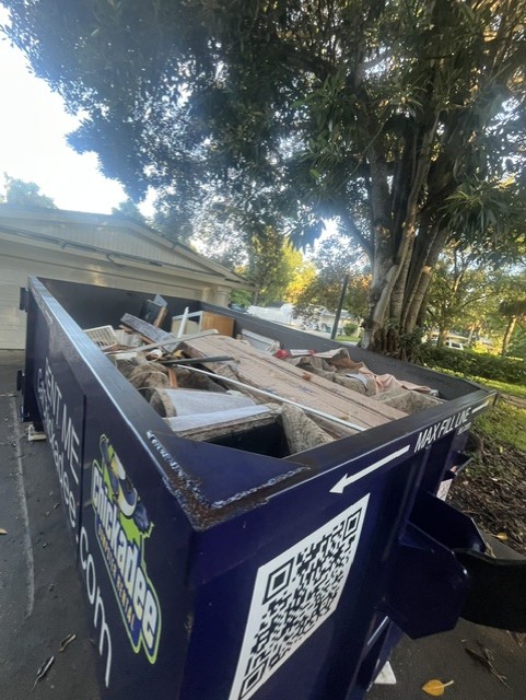 20-yard dumpster filled with home remodeling debris in Vero Beach