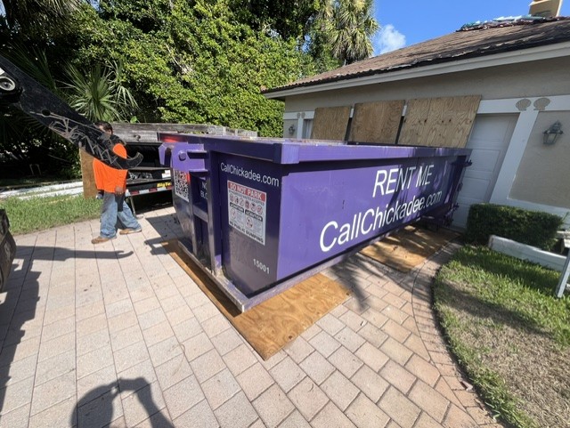 Roofing dumpster for tile removal in South Beach, Vero Beach