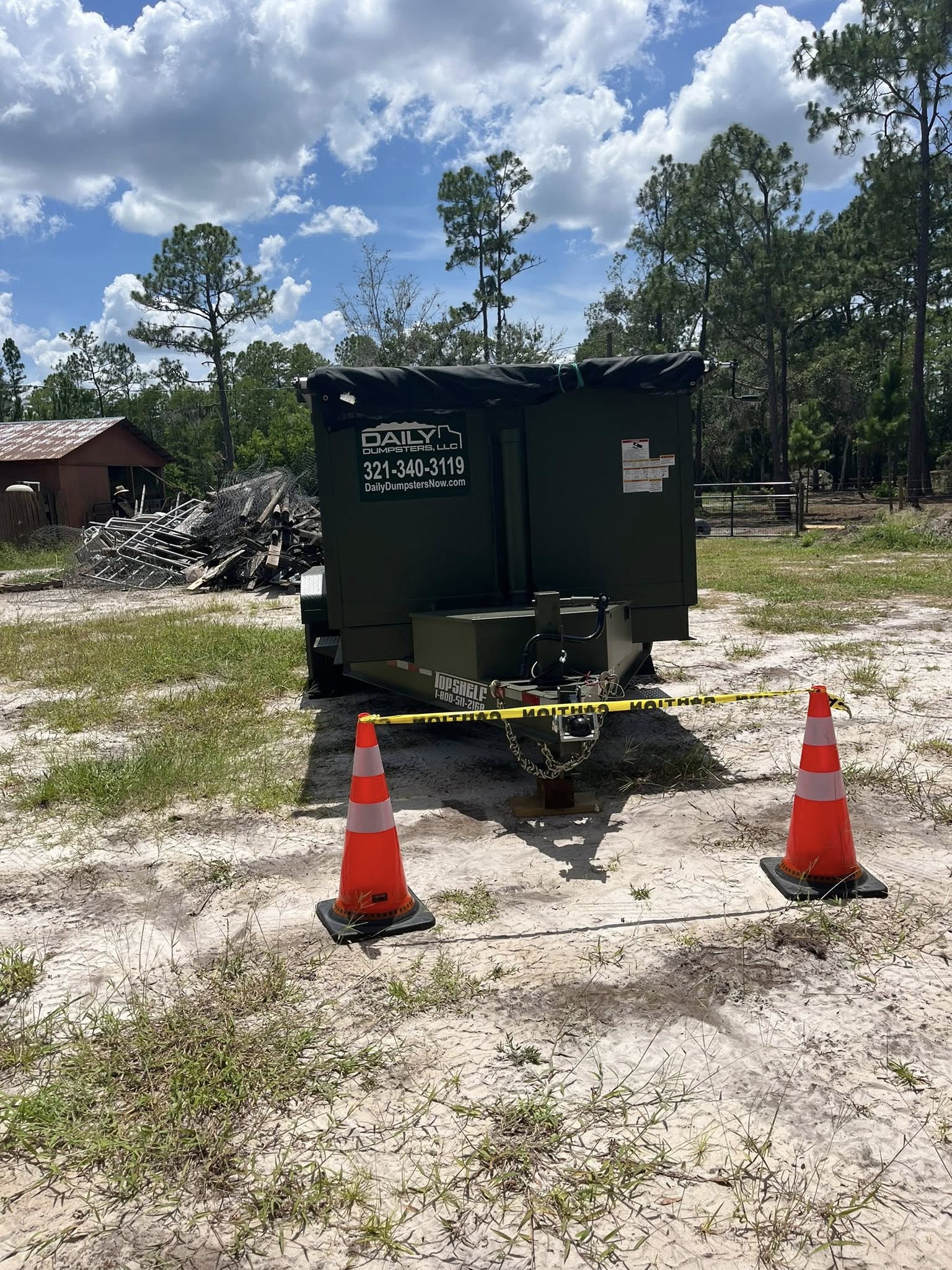 rlando homeowner using dumpster for hurricane debris and yard cleanup