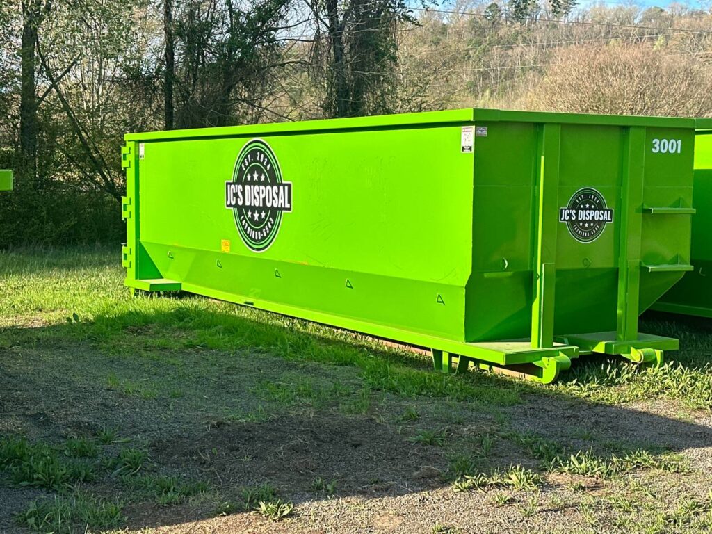 Green JC’s Disposal 30 yard roll-off dumpster for commercial dumpster rental in Russellville Arkansas