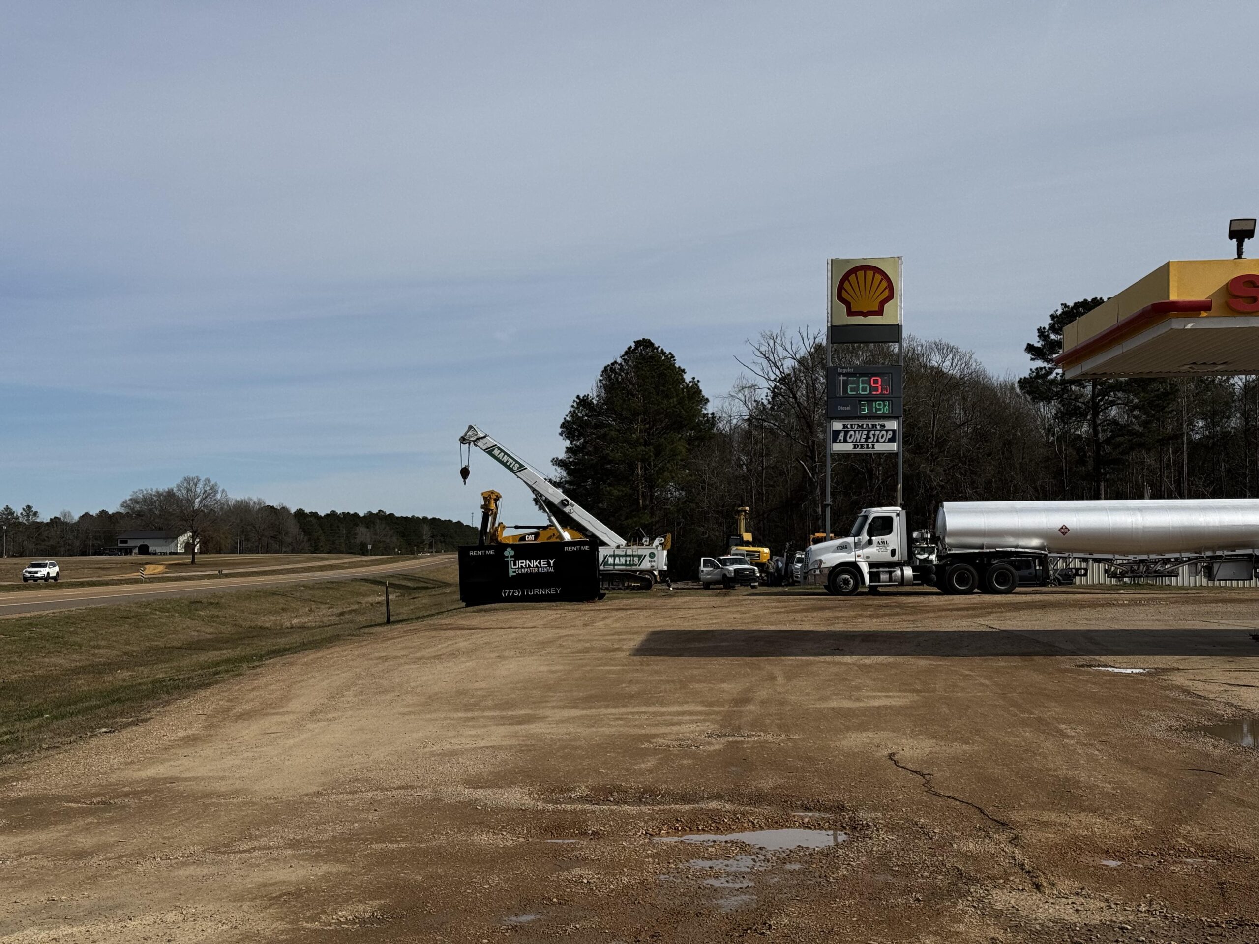 Turnkey Operations dumpster delivery at a commercial job site in southwest Mississippi